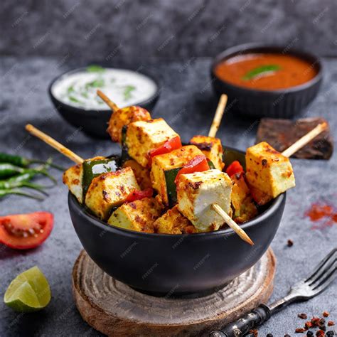 Premium Photo | Paneer tikka is an indian cuisine dish with grilled ...