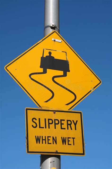 Slippery when wet. Written on a yellow road sign in new york #Sponsored ...