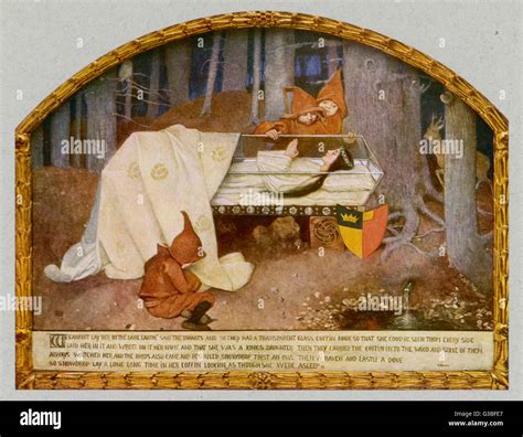 Snow White, in her glass coffin, is mourned by the dwarfs. (Story from Grimm Stock Photo - Alamy