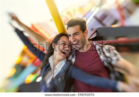 Laughing Couple Enjoy Riding Ferris Wheel Stock Photo 198592076 ...