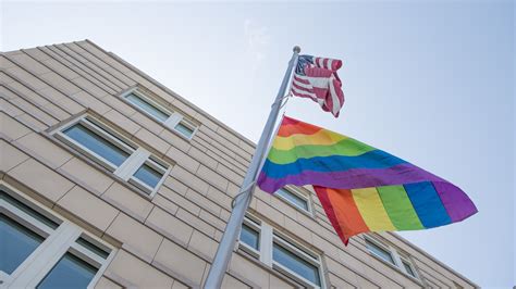 Biden Reverses Trump Ban on LGBTQ+ Pride Flags at U.S. Embassies | Them