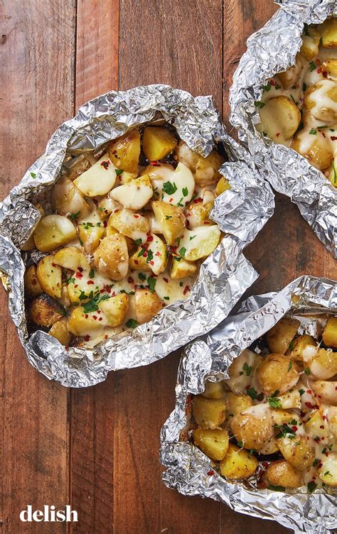 Cheesy Foil Pack Potatoes | Campfire food, Camping meals, Recipes