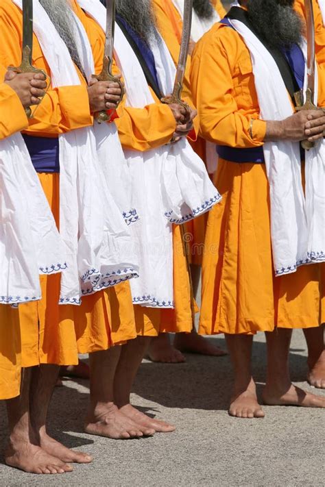 Barefoot Men with Orange Clothes Druing a Sikh Festival Stock Image - Image of guru, procession ...