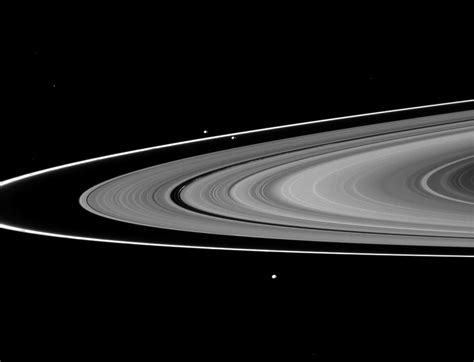 Weirdly Colored Saturn Moons Linked to Ring Features, NASA's Cassini ...