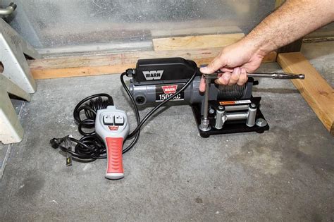 Installing an electric winch in your garage makes moving vehicles easy - Hemmings