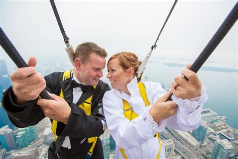 Canadian couple first to get married using CN Tower's EdgeWalk Wedding program | CTV News