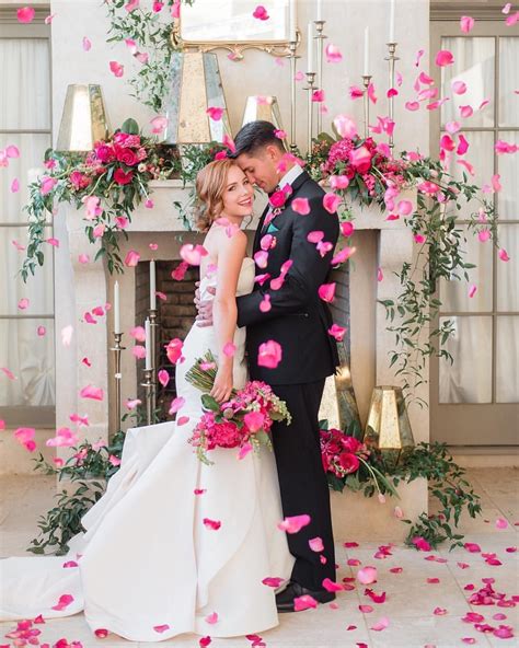 A rose petal wedding shoot is an especially good idea when you have pink flowers! The bright ...