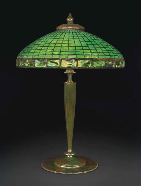 TIFFANY STUDIOS , A GEOMETRIC TABLE LAMP, CIRCA 1910 | Christie's