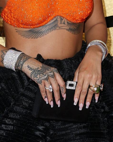 Rihanna's Sternum Tattoo | Rihanna's Tattoos and Meanings | POPSUGAR Beauty Photo 12