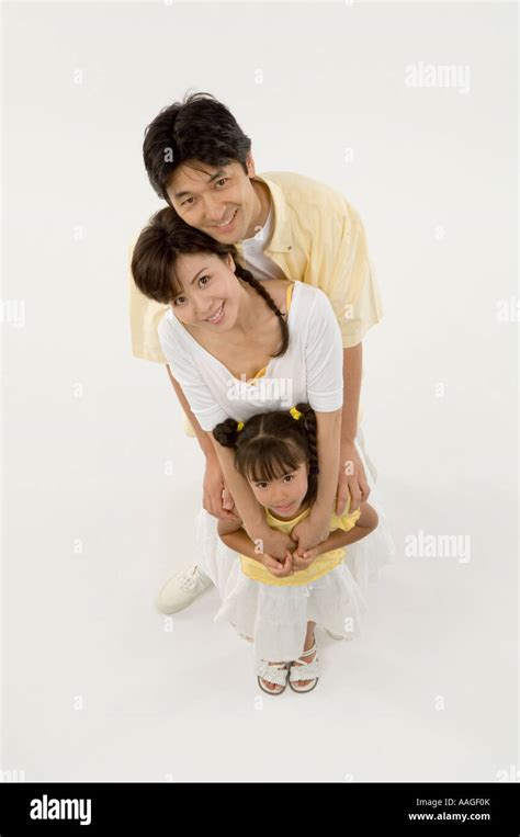 Portrait of family smiling Stock Photo - Alamy