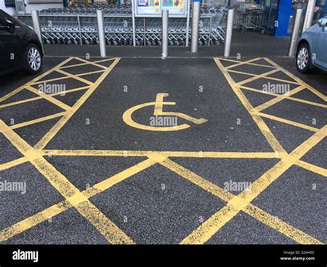 Disabled parking bay hi-res stock photography and images - Alamy