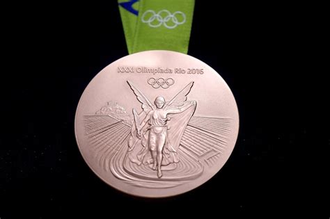 Rio 2016: Olympic Games medals revealed | CNN