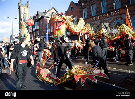 Chinese New Year celebrations in the Chinese quarter of Liverpool featuring a dragon Stock Photo ...