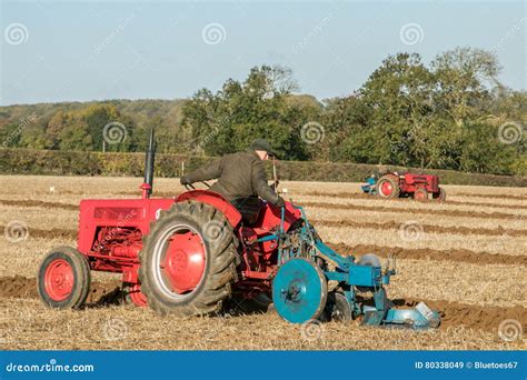 Two Old Vintage Red Tractors Ploughing Editorial Stock Image - Image of beautiful, farmer: 80338049