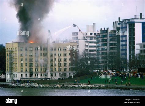 Firefighters / Firemen fighting Blazing Fire in Burning Building, Vancouver, BC, British ...