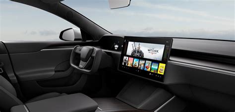 Tesla unveils new Model S with new interior, crazy steering wheel, and ...