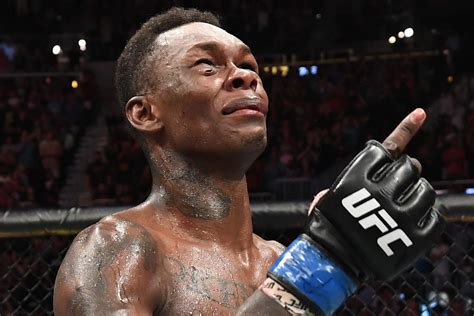 WATCH: Israel Adesanya Gets Emotional in the Cage After UFC 253 Victory - EssentiallySports