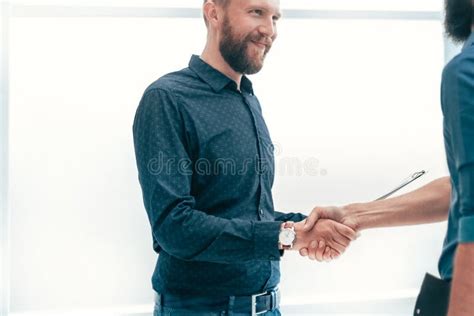 Smiling Business People Shaking Hands in the Office. Stock Photo ...