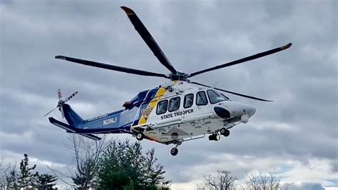 NJ State Police Helicopter N3NJ taking off from NJ State Police Troop B ...