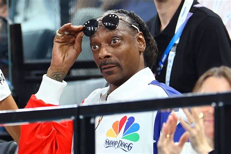 Snoop Dogg Ties His Granddaughters Shoes at Paris Olympics | NBC Insider