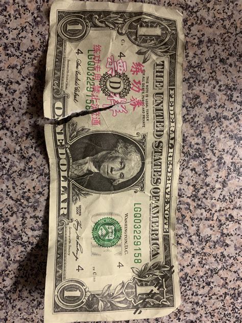 [Unknown > English] Found this fake dollar bill on the ground today ...