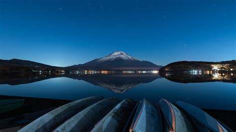 Night view of Mount Fuji from lake Yamanaka, Yamanashi Prefecture, Japan | Windows Spotlight Images