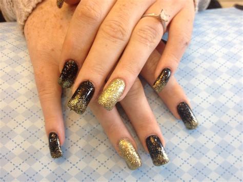 Acrylic nails with black gel polish an gold glitter | Flickr