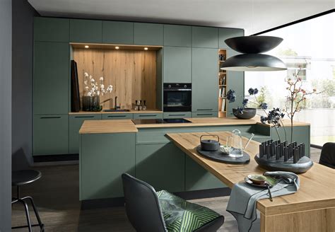 Naturally elegant kitchen island in impressive colour | nolte-kuechen.com