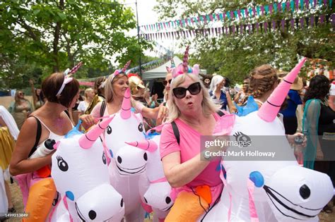 Festival goers attend the Isle Of Wight Festival 2023 at Seaclose ...