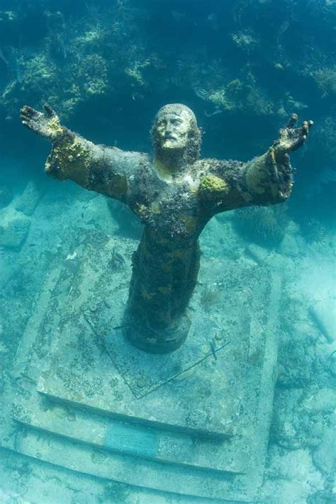 Jesus statue in the Keys. When I went there was coral on his head. | Christ of the abyss, Statue ...