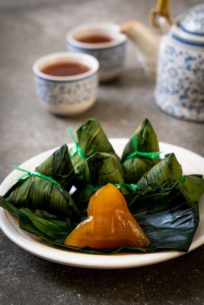 Premium Photo | Traditional Chinese sticky rice dumplings