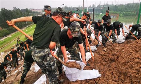 China floods: death toll climbs as questions raised over preparedness ...