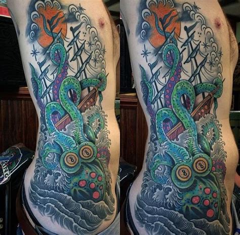 Old school multicolored massive octopus with ship tattoo on side - Tattooimages.biz