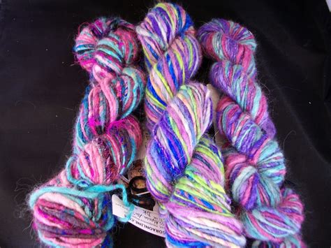 Handspun hand dyed 50% angora/35% merino/ 15% alpaca/ 5% silk yarn.