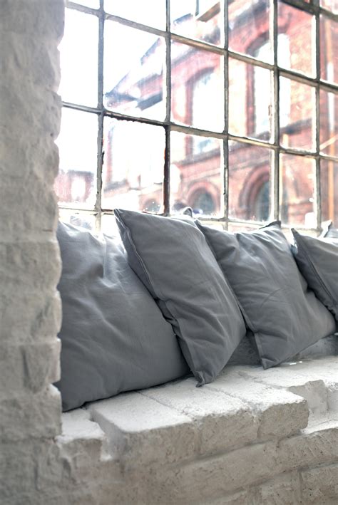 Pillows on the window · Free Stock Photo