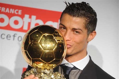 Cristiano Ronaldo with his 1st Balon d'Or. (2008)