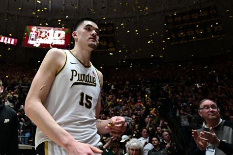 Purdue basketball player Lance Jones teaches Gene Keady a hype dance