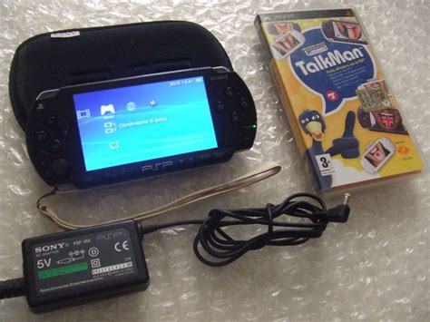 PSP 1004 - Playstation Portable + ACCESSORI e gioco TALKMAN + microfono ...