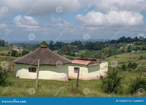 Yellow Painted Mud Hut / Rondavel with Thatched Roof in the Transkei ...