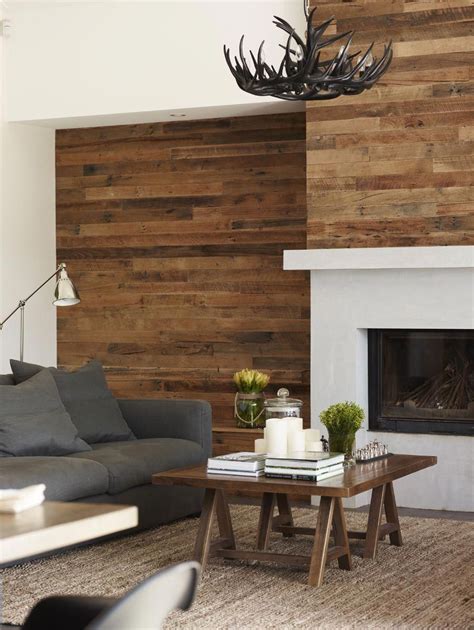 reclaimed timber boards recycled to create a timber feature wall in a ...