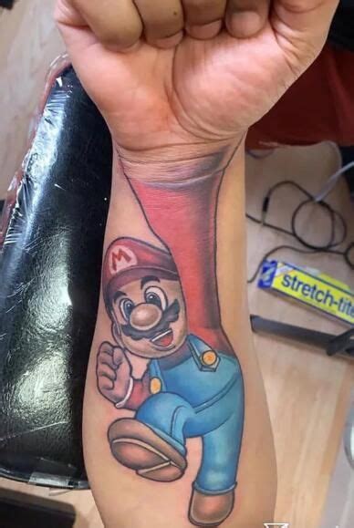 Didn't know Mario have two right hands... | Mario tattoo, Gamer tattoos, Gaming tattoo