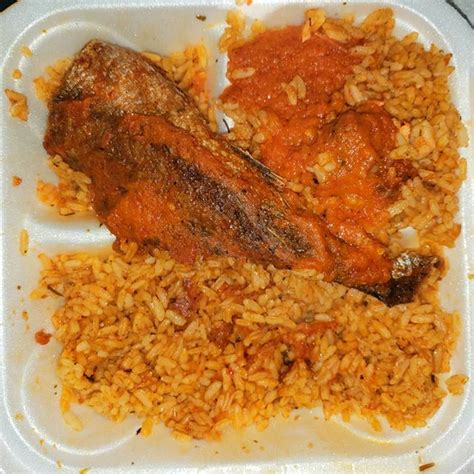 Dinner....Jollof rice, fish, and a little extra stew😍 #igmeal #instameal #dinner #igdinner # ...