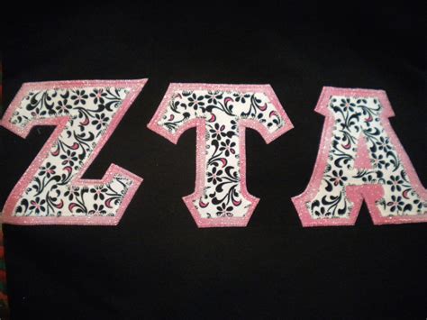 Zeta Tau Alpha black and white floral with sparkly pink background ...