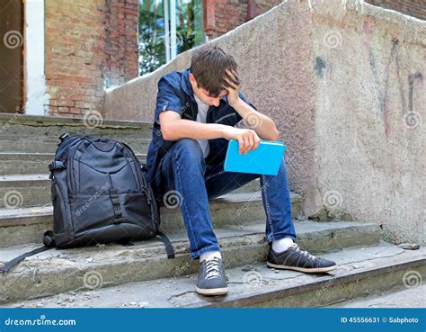 Sad Student with the Book stock image. Image of schoolhouse - 45556631