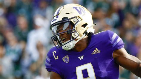 Michael Penix Jr. tosses four touchdowns as Washington stuns No. 11 Michigan State, 39-28 ...