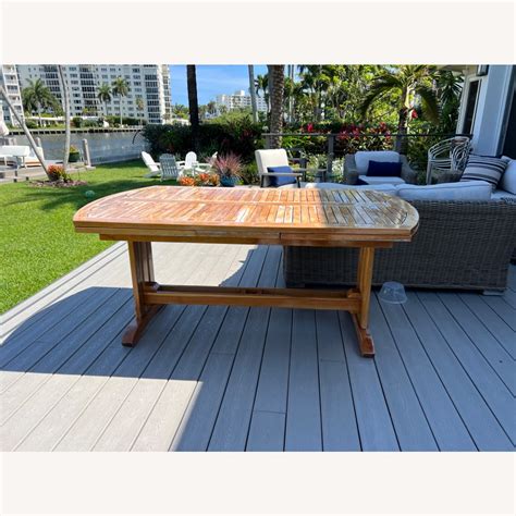 Teak Expandable Patio Table and 4 Chairs - AptDeco