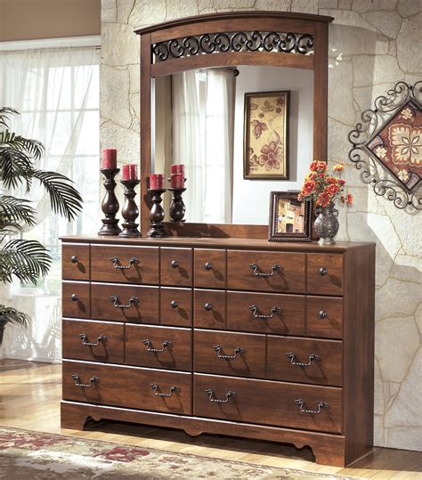 Ashley Signature Design Timberline 8 Drawer Dresser and Arched Mirror Set | Dunk & Bright ...