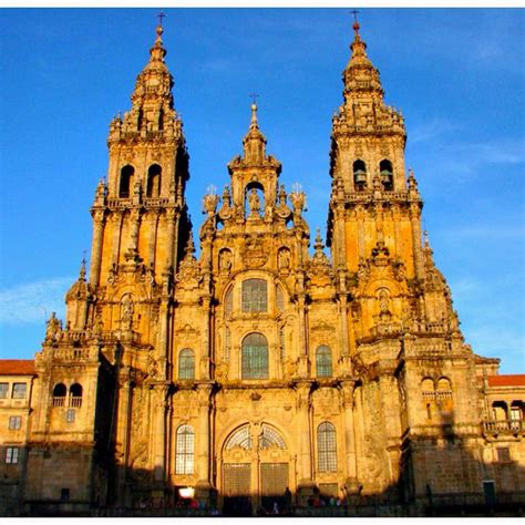 an old building with many windows and towers