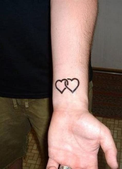 40+ Heart Tattoos | Heart tattoo wrist, Heart tattoo designs, Wrist tattoos