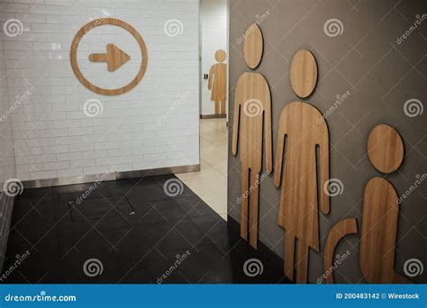 Bathroom with Signs for Males Females and People with Disabilities ...